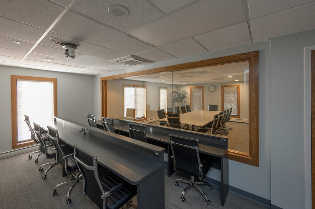 Private observation room in Horizon Group focus group facility with view of 12-person conference room.